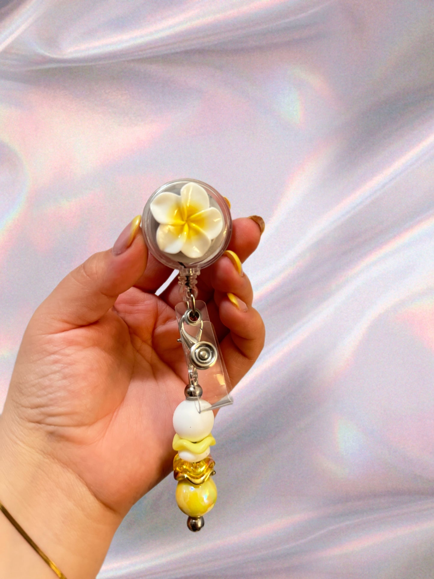 Badge reel + charm