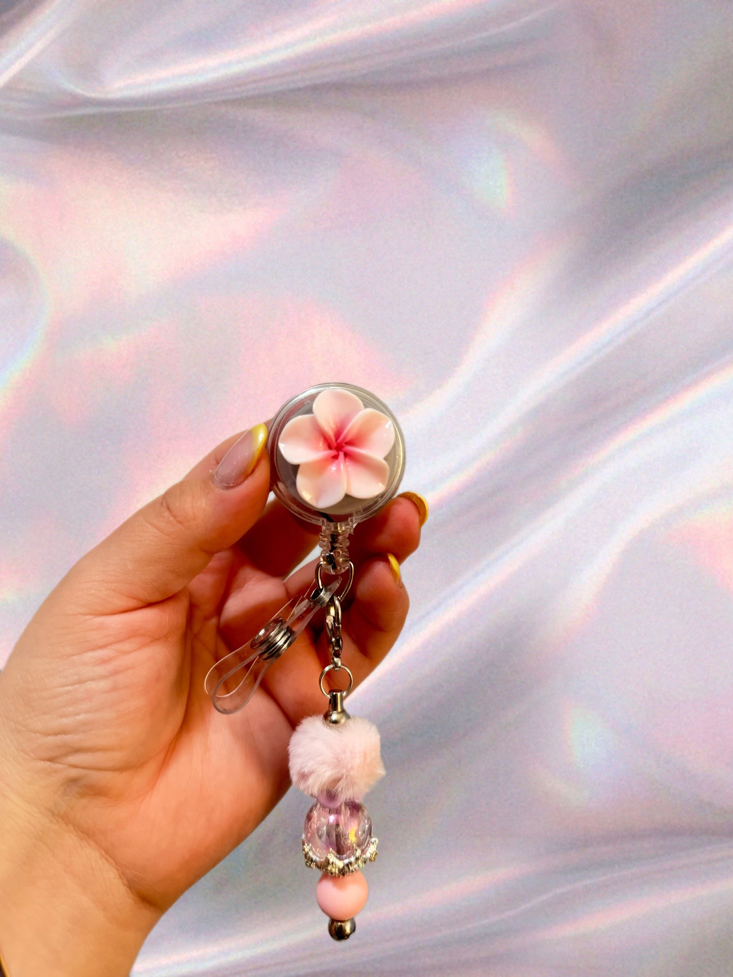 Badge reel + charm